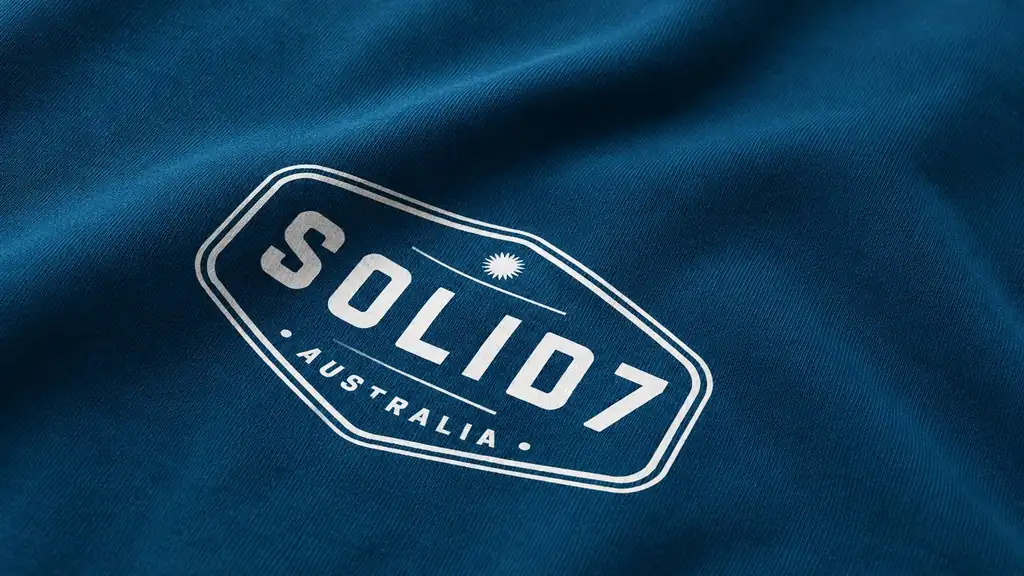 The Solid 7 Australia badge in white on a blue cotton panel